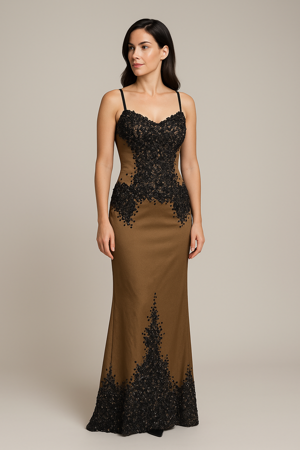 Model wearing Mandalay U01952DEBL embellished fit and flare gown with slim straps, detailed bodice, and floor-length hemline.