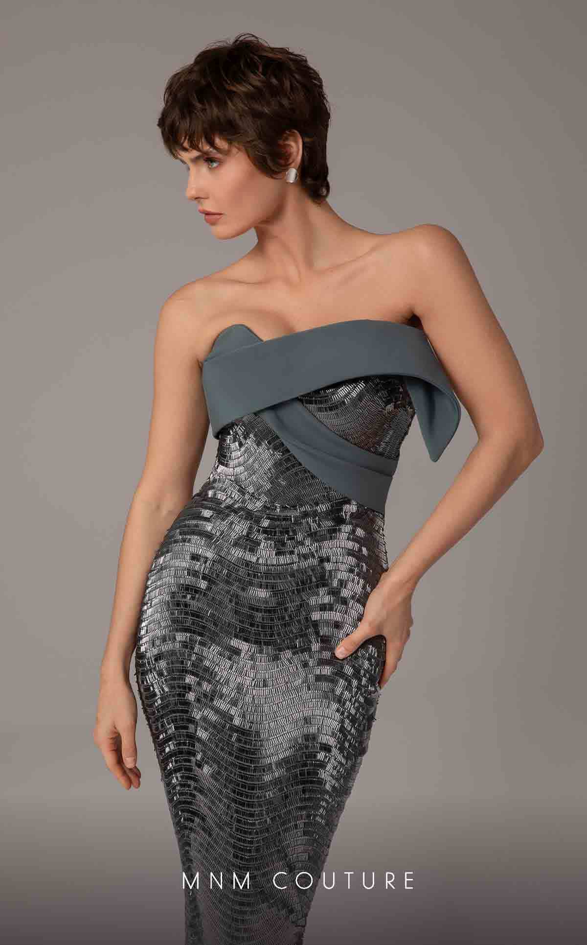 Model wearing the MNM Couture E0087 one-shoulder fitted evening gown with draped bodice and sequin detailing, shown in front and back views.