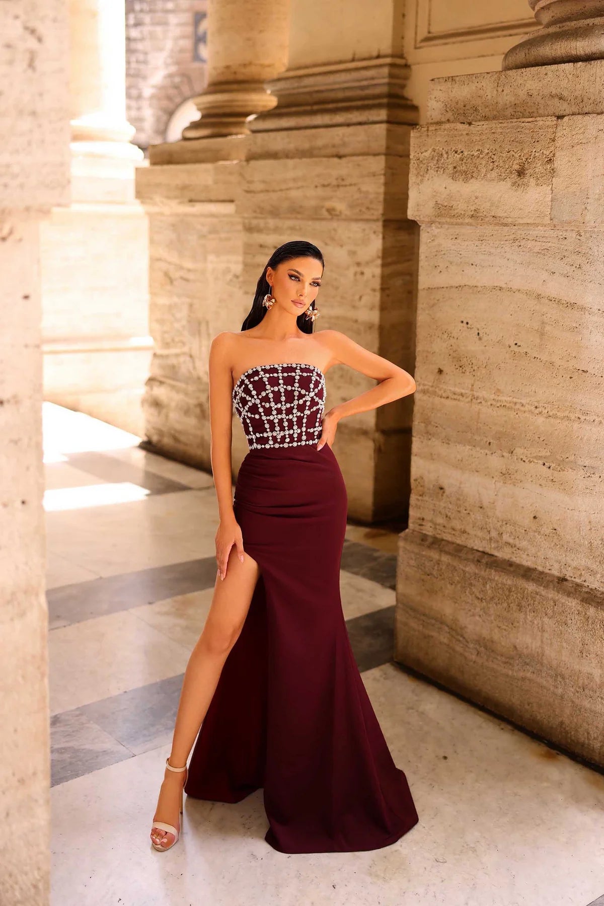 Nicoletta NC1092 Strapless Formal Evening Gown - A stunning strapless gown with a jeweled bodice, train, and high slit.