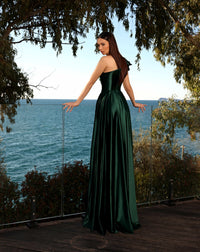 Model wearing Nicoletta NC2062 one-shoulder satin gown with ruffled shoulder and high slit in black, cadet blue, emerald, and vermillion.