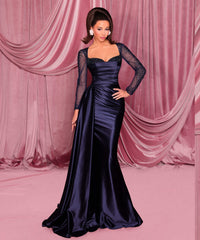 Model wearing Nicoletta NC3078 long sleeve embellished evening gown with sweetheart bodice, draped waist, and fit & flare silhouette.  Model is wearing the color mid-night.  Front View.