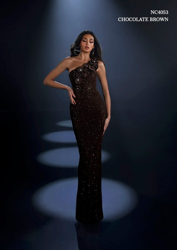 Model wearing Nicoletta NC4053 one-shoulder embellished gown with floral appliqué and fitted silhouette.