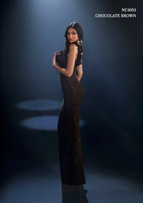 Model wearing Nicoletta NC4053 one-shoulder embellished gown with floral appliqué and fitted silhouette.