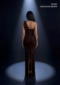 Model wearing Nicoletta NC4053 one-shoulder embellished gown with floral appliqué and fitted silhouette.