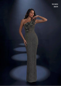Model wearing Nicoletta NC4053 one-shoulder embellished gown with floral appliqué and fitted silhouette.
