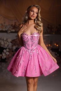 Model wearing Portia & Scarlett PS25784 mini dress with embellished corset and flared skirt.
