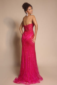 Model wearing Portia & Scarlett PS26004 strapless beaded mermaid gown with sweetheart neckline and intricate linear detailing.  Model is wearing the color fuchsia.  Back View.