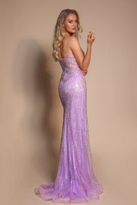 Model wearing Portia & Scarlett PS26004 strapless beaded mermaid gown with sweetheart neckline and intricate linear detailing.  Model is wearing the color lilac.  Back view of the dress.
