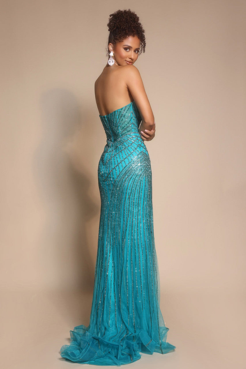 Model wearing Portia & Scarlett PS26004 strapless beaded mermaid gown with sweetheart neckline and intricate linear detailing.  Model is wearing the color peacock.  Back View of the dress.