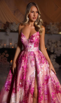 Model wearing Portia & Scarlett PS26075 strapless A-line gown with high slit and floral detailing.