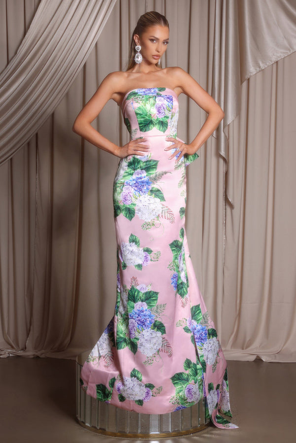 Model wearing Portia & Scarlett PS26308E strapless mermaid gown featuring an elegant floral motif and fitted silhouette.