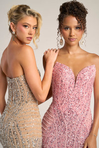 Two women wearing sparkling evening gowns against a neutral background