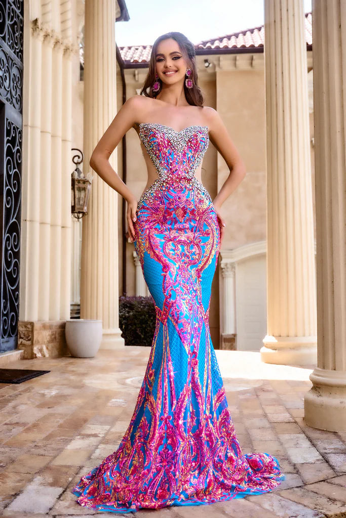 Portia&Scarlett PS24345 Stunning Mermaid Sequin Prom Dress - A fitted mermaid silhouette adorned with multi-color sequins, sheer panel sides, and a sweetheart neckline for a glamorous and captivating look at prom.