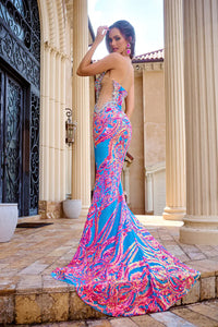 Portia&Scarlett PS24345 Stunning Mermaid Sequin Prom Dress - A fitted mermaid silhouette adorned with multi-color sequins, sheer panel sides, and a sweetheart neckline for a glamorous and captivating look at prom.