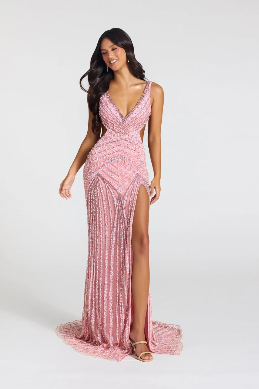 Portia & Scarlett PS27001C embellished fitted gown featuring a plunging V-neckline, geometric beading, open back, side cutouts, and thigh-high slit.  The model is wearing the dress in the color Pink.