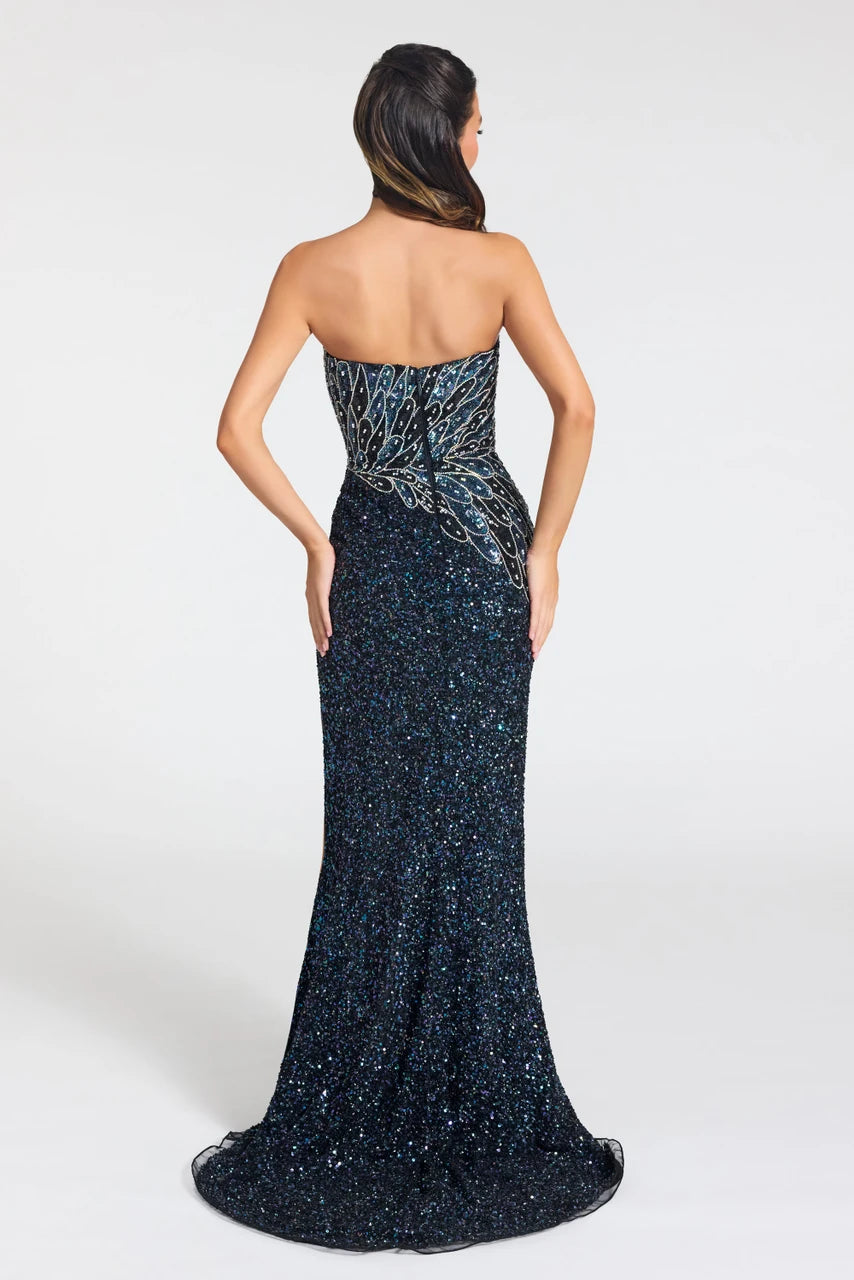 A strapless floor-length evening gown shown from the back on a model, featuring a shimmering dark navy blue sequined body with a lighter blue and silver abstract patterned bodice.