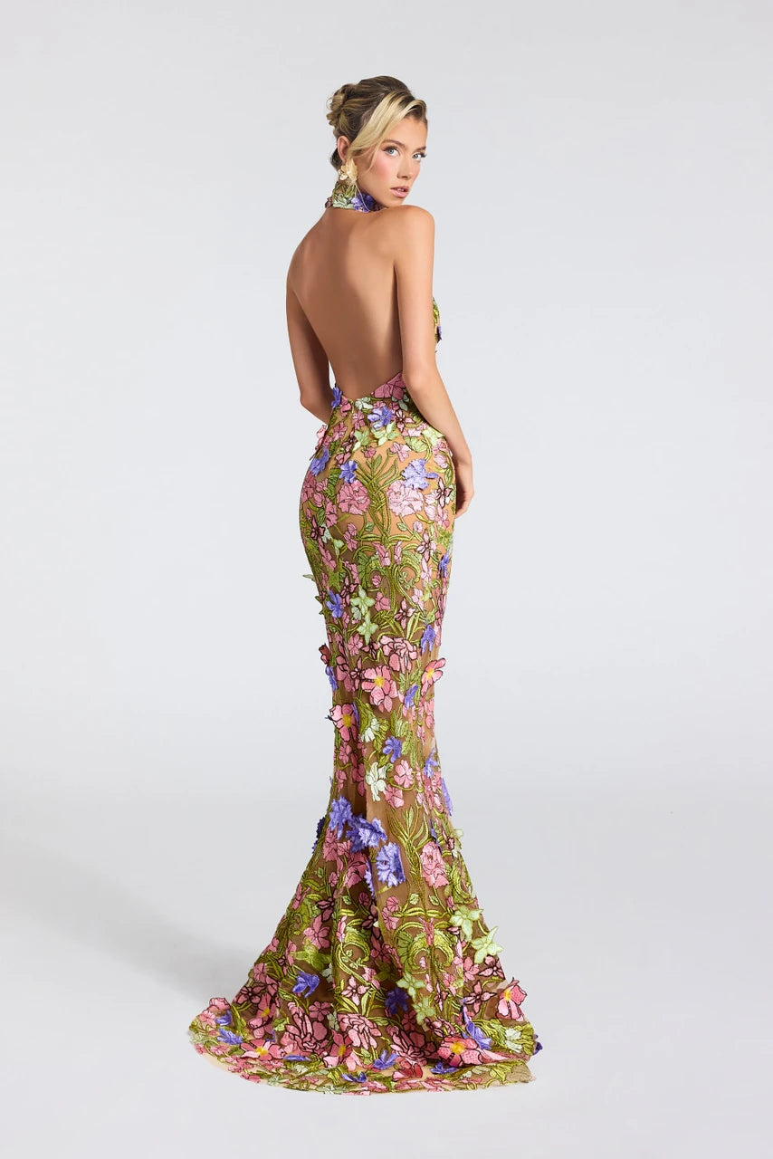 Portia & Scarlett PS27500E high neck floral mermaid gown featuring dimensional floral appliqués, a dramatic open back, and a sweeping train.
