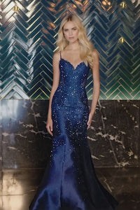Discover elegance and allure with Sherri Hill 55674 – a fitted mermaid lace mikado gown adorned with Hot (fix) stones. Perfect for prom, available at Madeline's Boutique in Toronto and Boca Raton, Florida.  Video of Model.