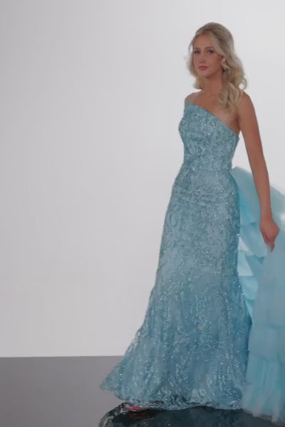 Jovani 26119 Glitter Embellished Strapless Formal Evening Gown - A captivating gown featuring glitter embellishments, a fitted silhouette, and a layered tulle overskirt. Perfect for formal evening occasions and prom for a glamorous and enchanting look.  This is a video of the dress.