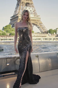 Sherri Hill 56934 strapless fitted gown featuring shimmering beadwork and a thigh-high slit, perfect for formal events, prom, and pageants.  Model is wearing the dress in the color black/silver.  This is a video.