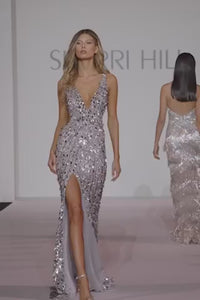 Sherri Hill 54912 Sequined Deep V-Neck Evening Gown - A glamorous sequined gown with a deep V neckline, open back, and high slit. Perfect for prom and evening formal events.   This is a video of the model wearing the dress and walking down the runway at the SHERRI HILL FASHION SHOW.