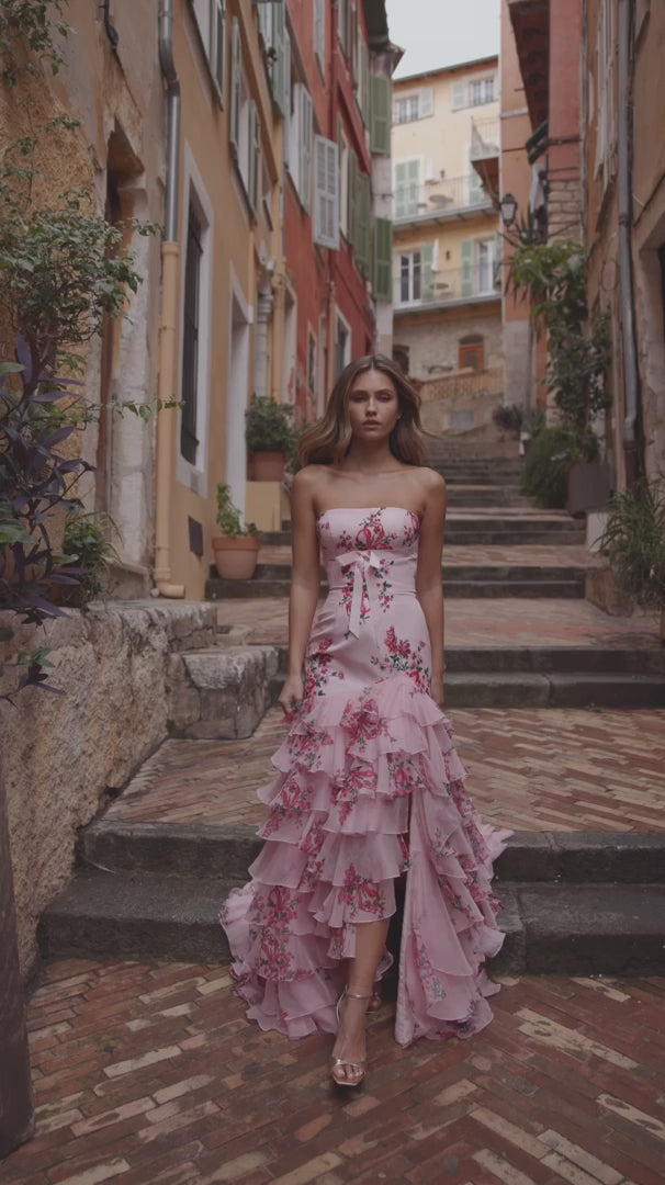 Model wearing Sherri Hill 57144 strapless gown with a fitted bodice and cascading ruffled tiered skirt.  This is a video.