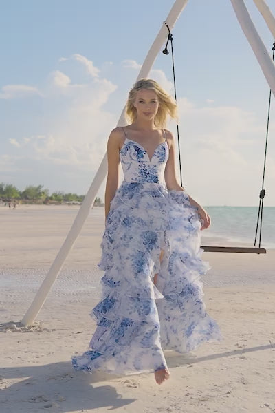 Sherri Hill 56098 Elegant Ruffle Chiffon A-Line Gown - A captivating chiffon A-line gown with beautiful ruffles, a taffeta bodice, and a skirt slit for a modern and elegant look.  This is a video of the model wearing the dress.