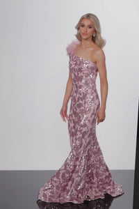 Jovani 25901 One Shoulder Sequin Mermaid Formal Evening Gown - A stunning one-shoulder gown with a sequin embellished pattern and feather detail for a show-stopping entrance at formal evening events.  This is a video of the model wearing the dress.