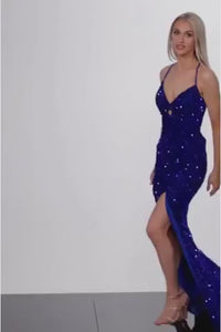 A beaded V-neck prom gown with a high slit, lace-up back, and small keyhole detail on the bodice. Perfect for prom and formal events.