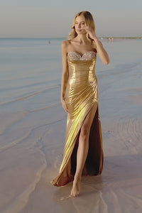 The Sherri Hill Metallic Strapless Fitted Gown, a glamorous choice featuring a beaded sweetheart neckline and a seductive skirt slit. Ideal for proms and formal events.  This is a video of the model wearing the dress.
