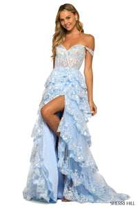 A captivating tulle sequin A-line gown with a sheer corset bodice, off-the-shoulder straps, and a ruffle high slit skirt. Ideal for prom, red carpet events, and pageants.