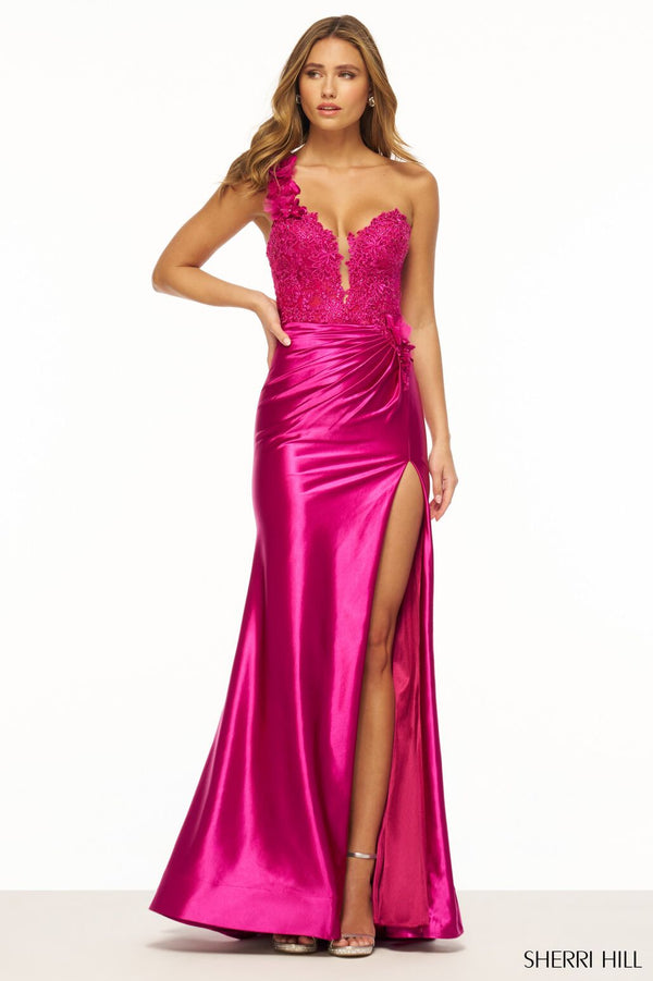 Sherri Hill 56174 One Shoulder Lace Prom/Evening Gown - A stunning gown featuring a one shoulder design, lace bodice with flower embellishments, sheer deep V neckline, and ruched stretched satin skirt with a slit for sophistication and glamour.