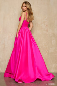 Shop Sherri Hill 57505, an A-line gown with a keyhole cutout and beaded floral embellishment—perfect for prom and formal events.