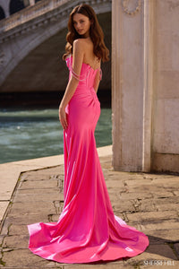 Model wearing Sherri Hill 57547 fitted gown with off-the-shoulder straps, beaded details, and a high slit