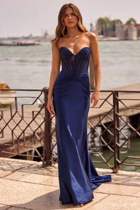 Model wearing Sherri Hill 57559 strapless fitted corset gown with sleek draped skirt.  Front View.