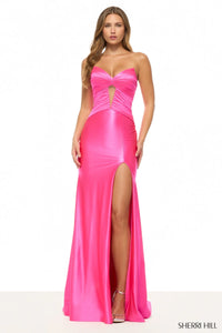 Pink evening gown with a high slit on a white background, featuring the Sherri Hill brand.