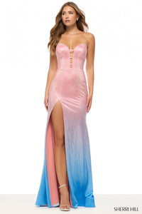 Woman wearing a pink and blue gradient evening gown with a slit on a white background, featuring the Sherri Hill brand.