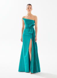 Stunning strapless draped dress with side pleat and bow by Tarik Ediz, available at Madeline's Boutique in Toronto and Boca Raton