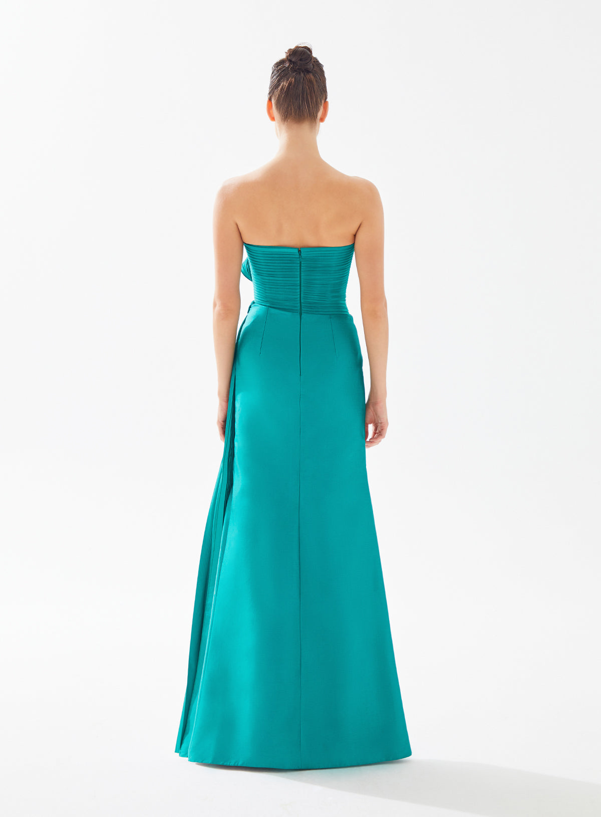 Stunning strapless draped dress with side pleat and bow by Tarik Ediz, available at Madeline's Boutique in Toronto and Boca Raton