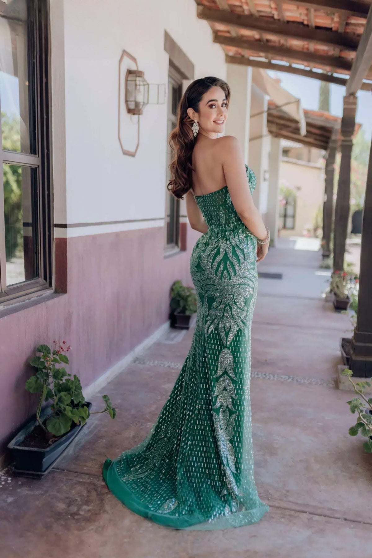 Elegant Terani Couture Prom Dress with Sparkly Embroidery | Perfect for Prom | Madeline's Boutique - Toronto and Boca Raton, Florida Locations.  Picture of Model wearing emerald.