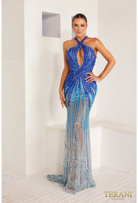 Terani 241GL2679 Ombre Beaded Halter Neck Evening Gown - A captivating gown with a bodycon silhouette, halter neck, and Ombre effect created by royal blue and light blue beaded and sequin embellishments. Ideal for prom and evening formal events.  The model is wearing the dress in Royal Ombre.