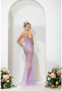 Terani 241P2071 Sparkling Plunge Neckline Evening Gown - A daring and sophisticated gown with a plunging neckline, bodycon silhouette, and sparkling embellishments. Ideal for prom and evening formal events. The model is wearing the dress in the color gunmetal.