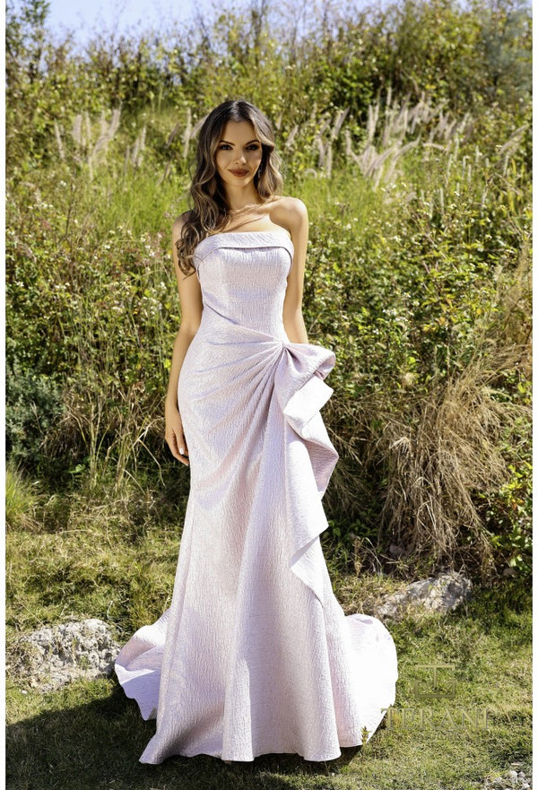 Model wearing Terani 252E5200 strapless metallic jacquard fit and flare gown with side draping detail.  Model is wearing rose pink.