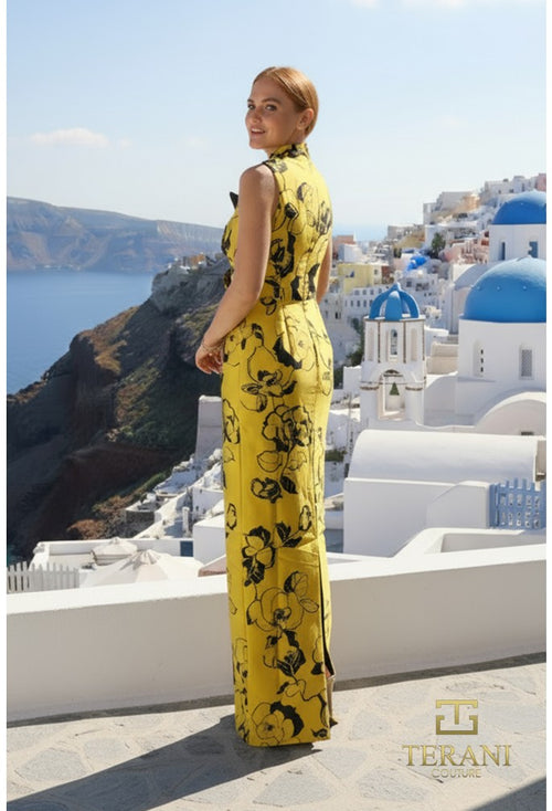 Woman in a yellow floral dress standing in front of a scenic view with blue domes.