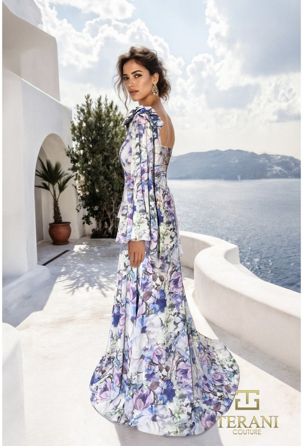 Model wearing the Terani 261E6644 one-shoulder A-line gown with flutter sleeves, featuring a flowing silhouette and elegant drape.