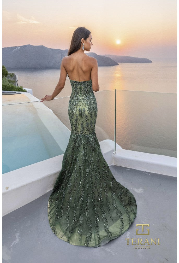 Model wearing the Terani 261GL6001 sweetheart beaded mermaid gown with fitted silhouette, keyhole neckline detail, and flowing skirt at a luxury resort setting.