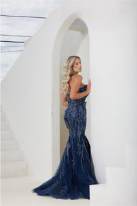 Terani Couture 241P2219 Sleeveless Beaded Trumpet Evening Gown - A sophisticated evening gown with a sleeveless trumpet silhouette, beaded detailing on tulle, a sweetheart neckline, and a long dress for a timeless and glamorous look. This is a picture of the dress in Navy.