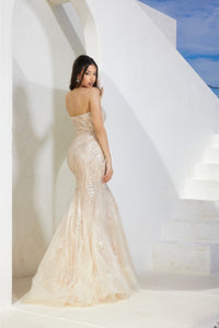 Terani Couture 241P2219 Sleeveless Beaded Trumpet Evening Gown - A sophisticated evening gown with a sleeveless trumpet silhouette, beaded detailing on tulle, a sweetheart neckline, and a long dress for a timeless and glamorous look. This is a picture of the dress in Champagne.