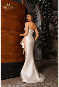 Model wearing Terani Couture 251E4265 off-shoulder pleated gown with fitted silhouette and high slit, perfect for gala, red carpet, or formal evening event.
