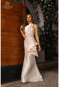 Model wearing Terani Couture 251E4265 off-shoulder pleated gown with fitted silhouette and high slit, perfect for gala, red carpet, or formal evening event.